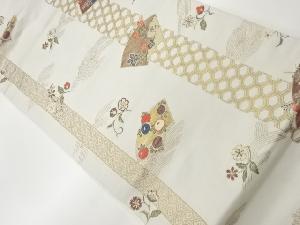 地紙に草花・荒波模様織出し名古屋帯